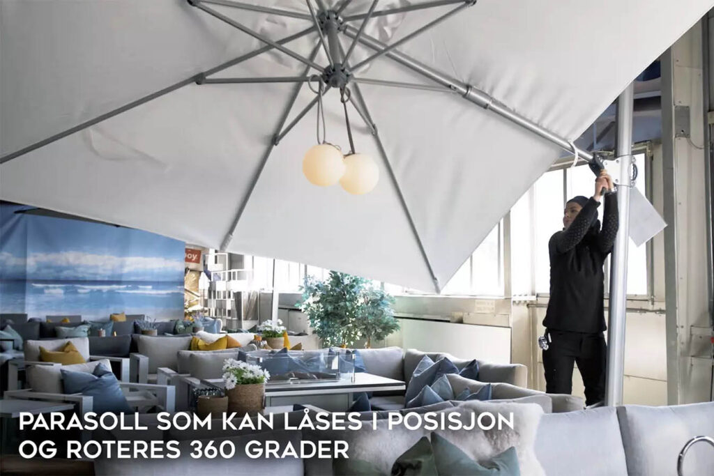 Parasoll fra Fine Design Hagemøbler som kan låses i posisjon og roteres 360 grader